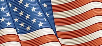 Close-up of American flag waving.
